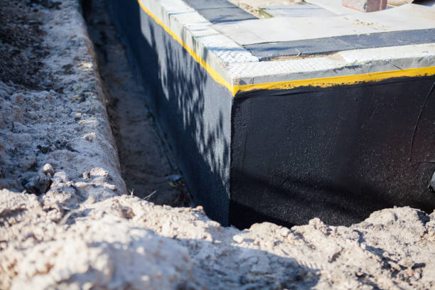 Professional Waterproofing technician working in Abingdon, VA